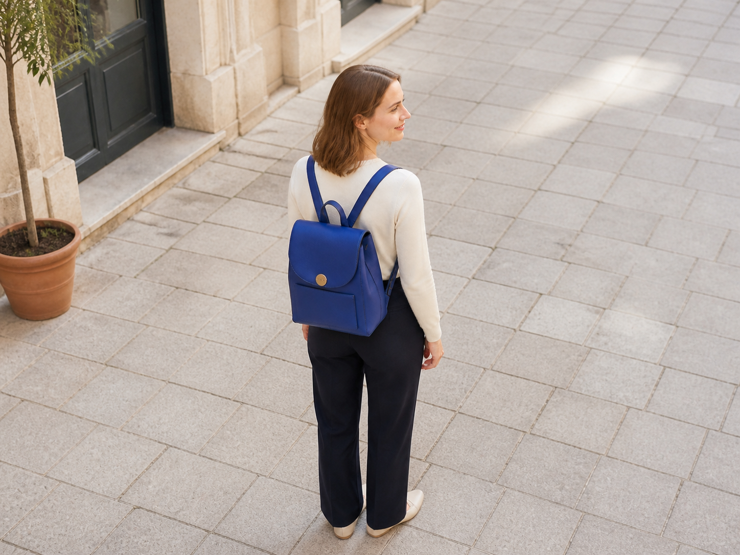 Blue backpack lifestyle photo from a high camera angle